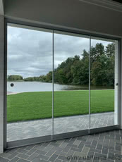 Безрамное раздвижное остекление