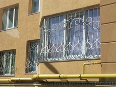 Кованые решетки на окна (своя кузня)