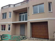 Секционные ворота Ryterna - автоматические гаражные ворота для Вашего дома