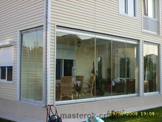 Балконное безрамное остекление