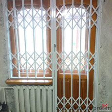 Решетки раздвижные Prof на балконный блок