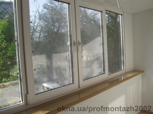 Отделака балкона. Глянцевый подоконник DANKE цвет "золотой дуб". —  Отделака балкона. Глянцевый подоконник DANKE цвет "золотой дуб". —