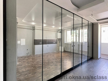 Розсувні скляні перегородки
