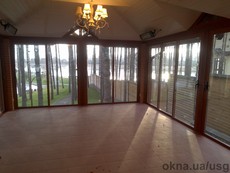 Остекление веранды раздвижными конструкциями