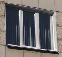 Тепле тристулкове вікно в зал.