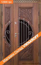 Дверь входная (металлическая) уличная полуторная с ковкой и патиной