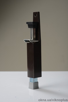 Підлоговий фіксатор двері білий, коричневий.