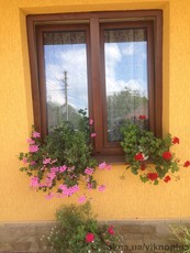 Новітня віконна система з 7-камерного профілю REVOLUTION.