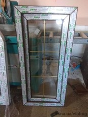 Металопластикове вікно 570х1210 мм, коричневе.