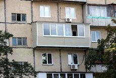 Внешняя отделка балкона сайдингом