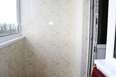 Обшивка балкона пластиковой вагонкой в Киеве