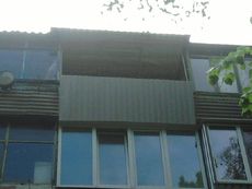 Обшивка балконов снаружи.