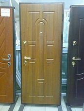 Двері металеві з МДФ та деревянними накладками