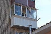 Обшивка балконів зовні сайдингом