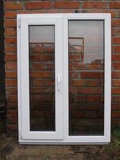 Окно двухстворчатое с глухой и поворотно-откидной створками из профиля Windoff’s