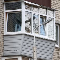 Обшивка сайдингом на Шулявке