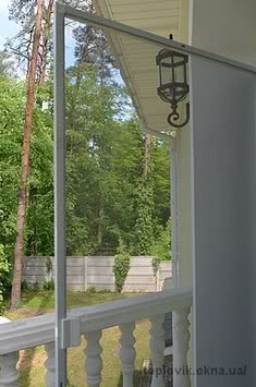 Москітні сітки на балконні двері