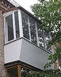 Вынос балкона по перилам с наружной обшивкой недорого