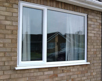 Двухчастное окно из профиля ALMplast, фурнитурой Maco и однокамерным энергосберегающим стеклопакетом