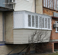 Обшивка балкона сайдингом на Осокорках