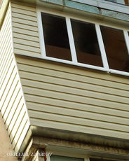 Обшивка балкона сайдингом на Теремках