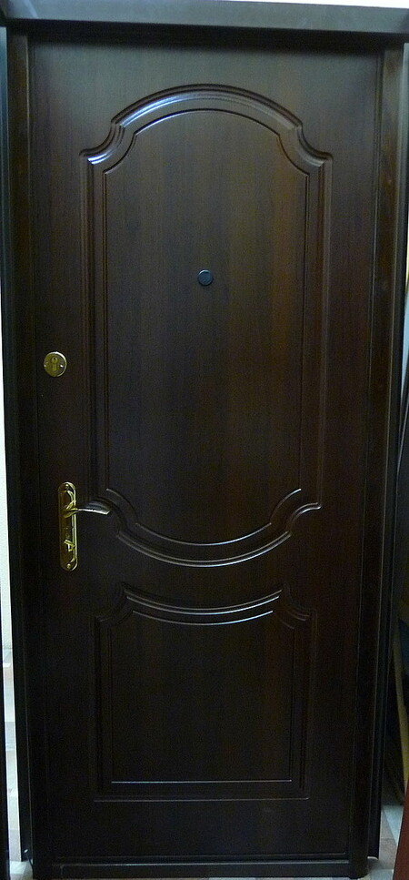 Металеві двері - обробка МДФ.
