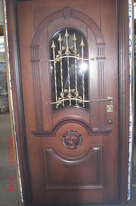 Двері вхідні металеві з дубовими накладками 0677599522